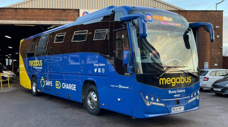 A blue bus with the words 'Bussy Galore' on the front