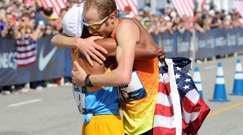 Meb Kelflezighi and Jared Ward celebrate after qualifying for the Olympics at the U.S. Olympic Team Trials Men