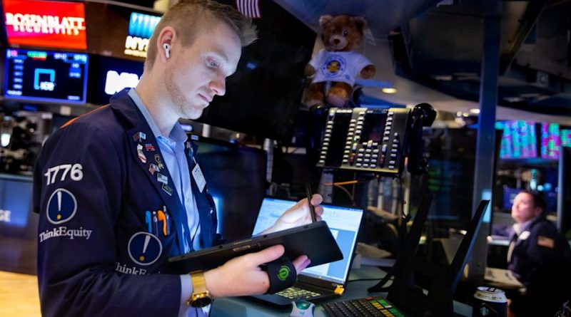 A trader works at the New York Stock Exchange in New York, the United States, Feb. 28, 2022. U.S. stocks closed mixed on Monday as investor eyed updates regarding the Russia-Ukraine conflict.The Dow Jones Industrial Average fell 166.15 points, or 0.49 percent, to 33,892.60. The S&P 500 decreased 10.71 points, or 0.24 percent, to 4,373.94. The Nasdaq Composite Index rose 56.78 points, or 0.41 percent, to 13,751.40. (Allie Joseph/NYSE/Handout via Xinhua)