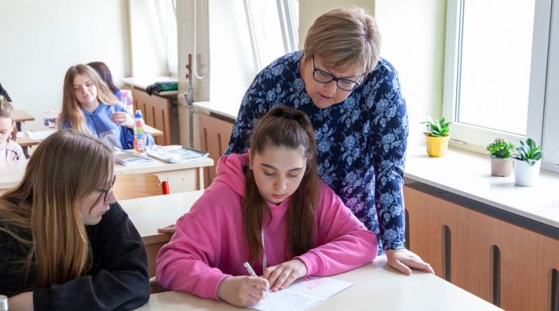 13-year-old Ukrainian refugee Sofia attends a geography class led by her teacher Ewa Golofit at Primary School no. 58 in Warsaw, Poland.
