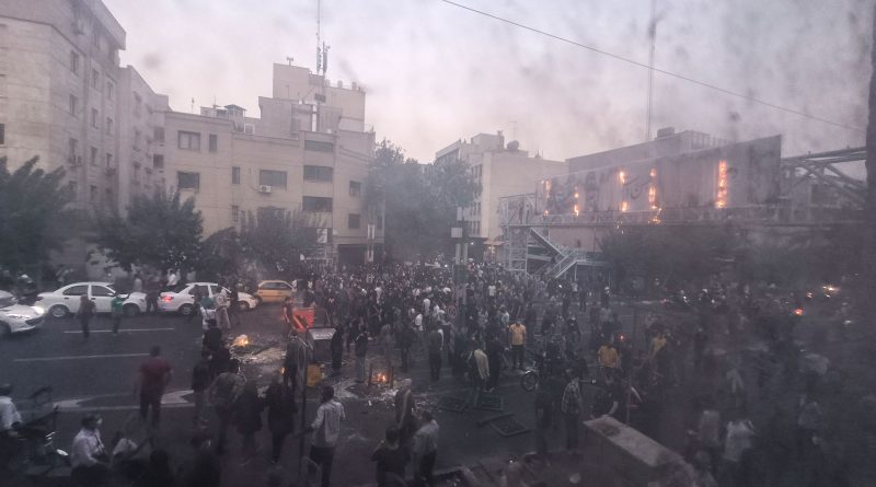 <b>Tehran, Iran </b>People gather during a protest for Mahsa Amini, who died after being arrested by morality police allegedly not complying with strict dress code in Tehran, Iran on September 20, 2022. Protests spread to 15 cities across Iran overnight over the death of the young woman Mahsa Amini after her arrest by the country’s morality police. In the fifth night of street rallies, police used tear gas and made arrests to disperse crowds of up to 1,000 people, the official IRNA news agency said. (Middle East Images/Redux)