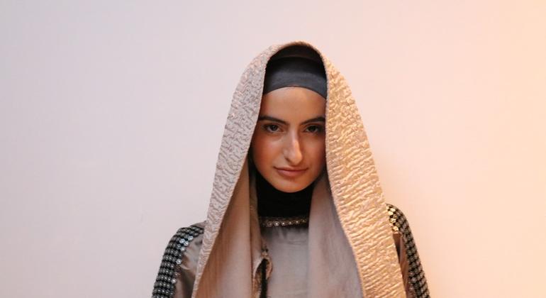 Model wears a No Nation Fashion outfit, at 2022 New York Fashion Week event.