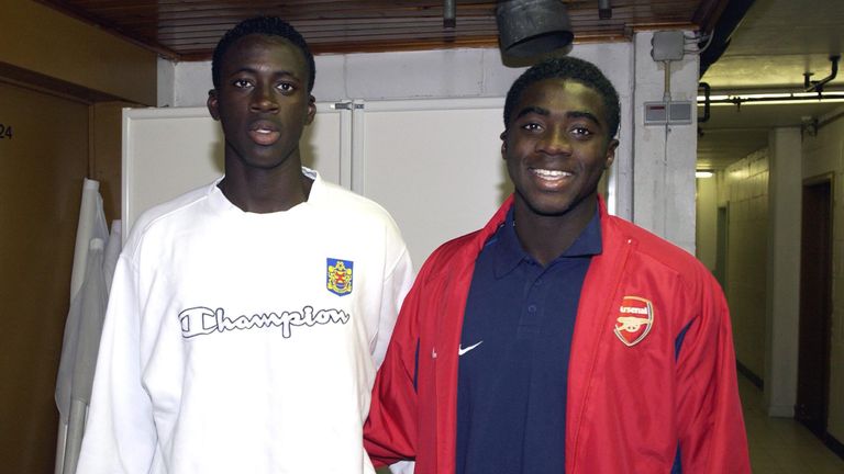 Yaya Toure and his brother Kolo Toure pictured ahead of a friendly between Belgian club Beveren and Arsenal in 2002