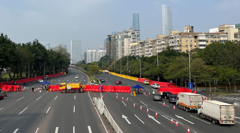 Barriers form a security checkpoint in the Haizhu district in Guangzhou in southern China's Guangdong province, Friday, Nov. 11, 2022. As the country reported 10,729 new COVID cases on Friday, more than 5 million people were under lockdown in the southern manufacturing hub Guangzhou and the western megacity Chongqing. (AP)