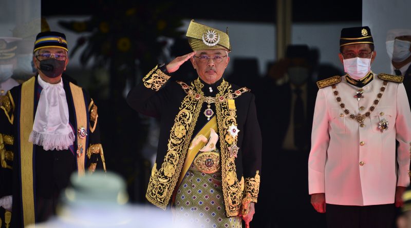 Malaysia's King Sultan Abdullah Sultan Ahmad Shah, center, salutes during the opening ceremony of the parliamentary session in Kuala Lumpur, May 18, 2020. (Shaiful Nizal Ismail—Malaysia's Department of Information/AP)